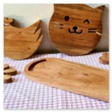 Taglieri in legno con forme di animali